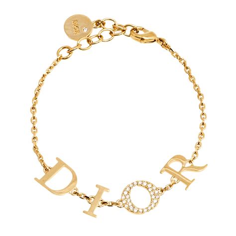 dior gold background|gold dior bracelet.